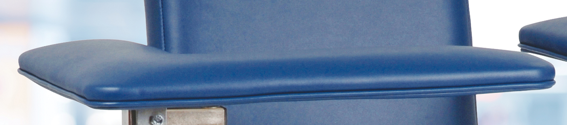 An example of an L-Arm blood draw chair.