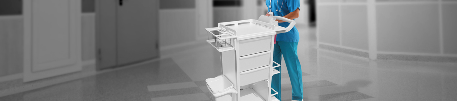 Woman walking cart down corridor